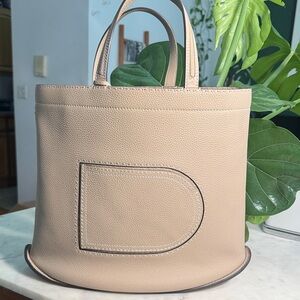 Chic Beige Tote Bag with Embossed Detail